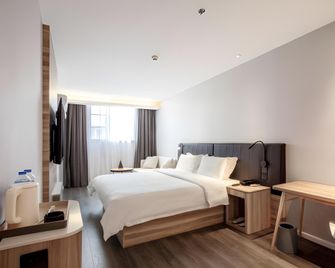 Hanting Hotel Guiyang Railway Station Qingyun Market - Guiyang - Bedroom