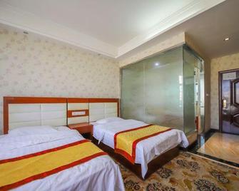 Jinhuang Business Hotel Xilinhot - 시린궈러멍 - 침실