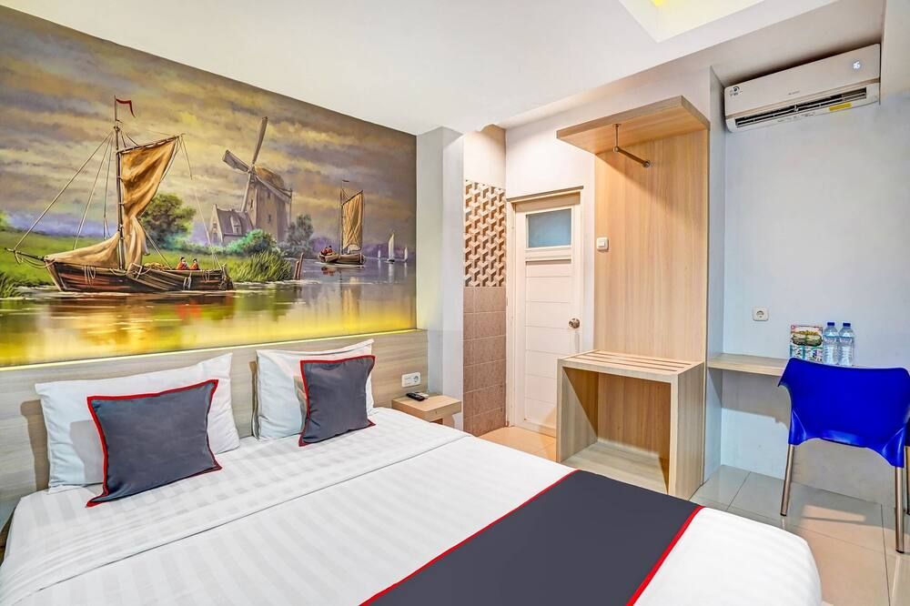 Hotel O Gardenia Boarding House - Purwokerto - Schlafzimmer