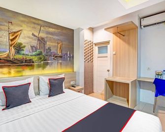 Hotel O Gardenia Boarding House - Purwokerto - Schlafzimmer