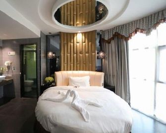 Qingmu Chain Hotel (Xinghua Zhengbanqiao Former Residence) - Taizhou - Bedroom