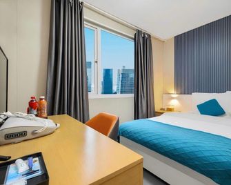 Kaili Yijia Hotel - Qiandongnan - Bedroom