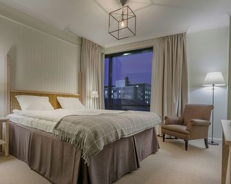Hotel Bishops Arms Piteå - Piteå - Schlafzimmer