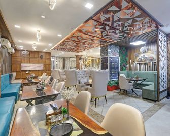 Status By Hotel The Emporio 3-star Hotel l Vaishali, Ghaziabad - Ghaziabad - Restaurant