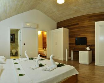 Apella Hotel - Cirali - Slaapkamer
