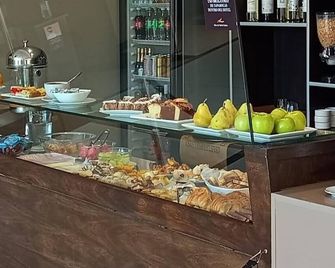 Altos De Merlo Suites - Villa de Merlo - Buffet