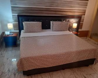 Résidence Hôtel La Grace - Abiyán - Habitación