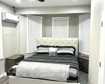 Charming 2-bedroom apartment in cool Baltimore with AC, WiFi - Baltimore - Habitación