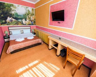 Apartment Hotel - Blagoveshchensk - Camera da letto