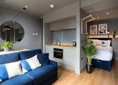 Hiding Space - Trim Street Apartments - Bath - Living room