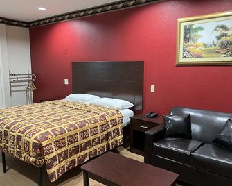 Scott Inn & Suites - Downtown Houston - יוסטון - חדר שינה