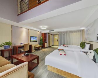 Panda Prince Hotel Suining Branch - Suining - Bedroom