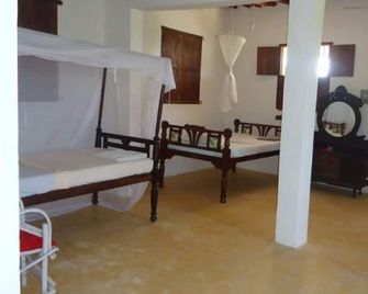 Dudu Villas N Cottages - Lamu - Bedroom