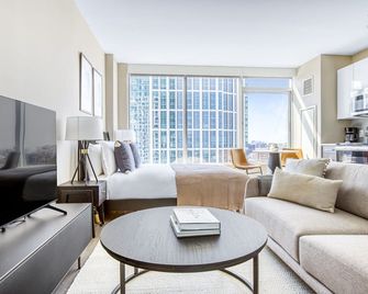 Luxe North Station Studio w/ Gym & W/D, near TD Garden, by Blueground - Boston - Wohnzimmer