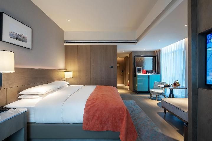 Phoenix Hotel - ז'נגז'ו - חדר שינה
