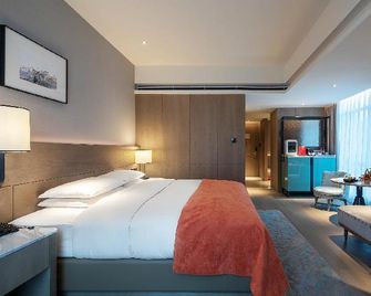 Phoenix Hotel - Zhengzhou - Habitación