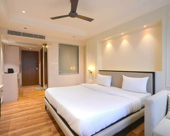 Hotel Square 36 - Kota - Schlafzimmer