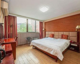Lijiacheng Hotel - تشانغشا - غرفة نوم