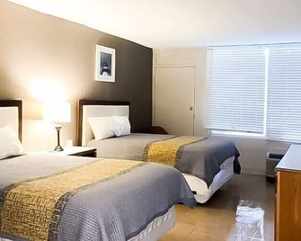 Apm Inn & Suites - Martinsburg - Schlafzimmer