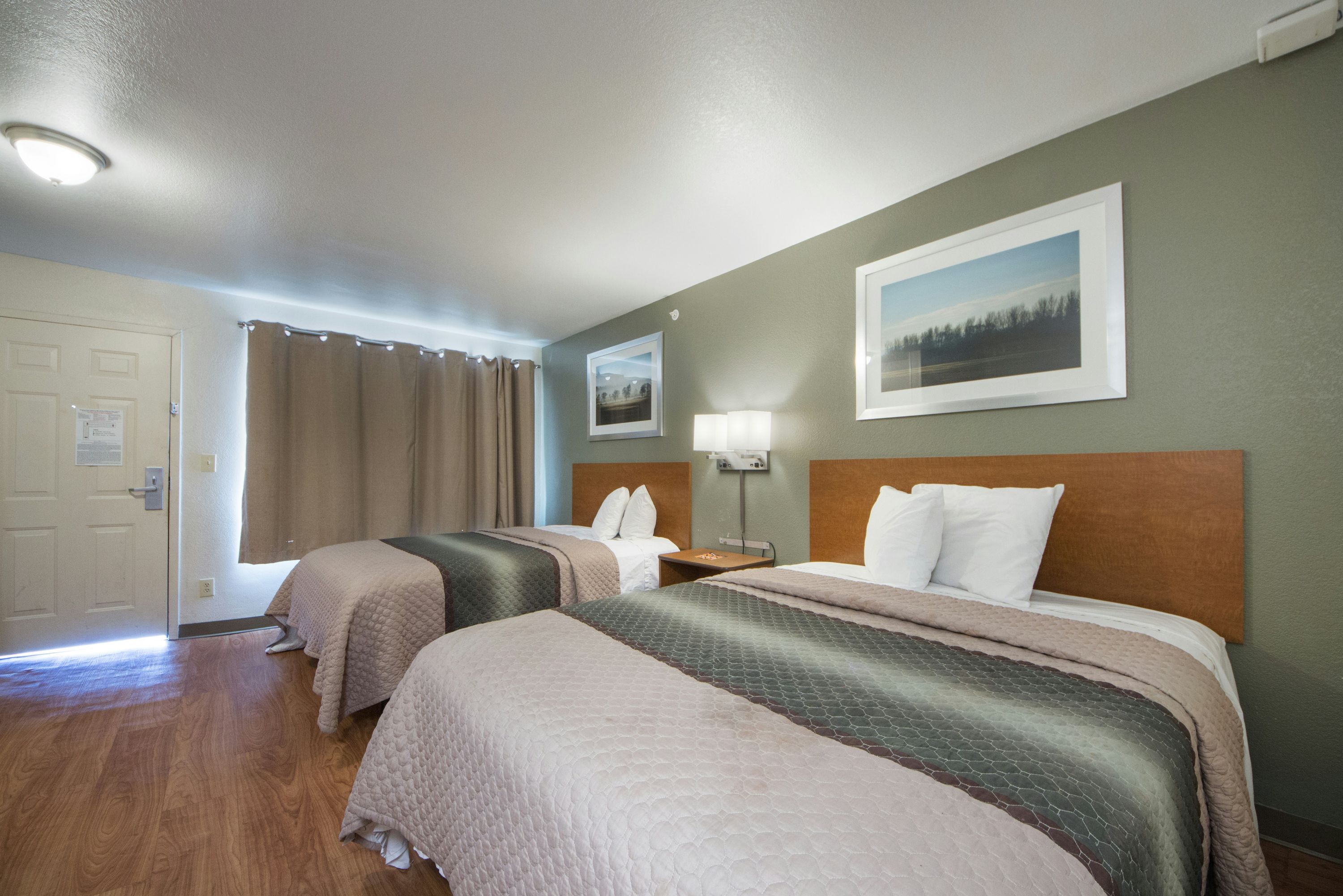 HomeTowne Studios by Red Roof Dallas - Irving - Irving - Bedroom