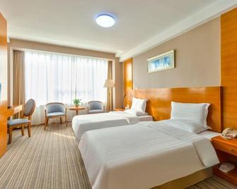 Bolt Hotel - Dalian - Habitació