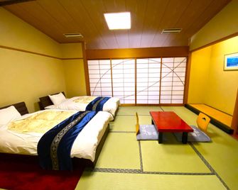 Misasa Onsen Koraku - Misasa - Bedroom