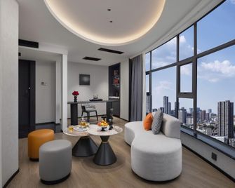 Changsha Binjiang Mei Yasi International Hotel - Changsha - Living room