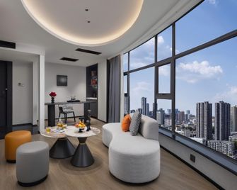 Changsha Binjiang Mei Yasi International Hotel - Changsha - Vardagsrum