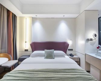 Yiwu Qingtao E-sports Hotel - Jinhua - Bedroom