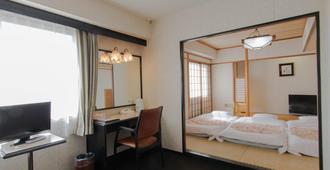 Airport Side Kagoshima Kuko Hotel - Kirishima - Bedroom