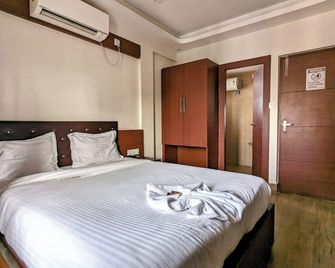 The Aster Enclave Hotel - Calcuta - Habitación