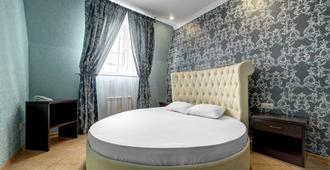 Hotel Marton Rokossovskogo - Volgograd - Camera da letto