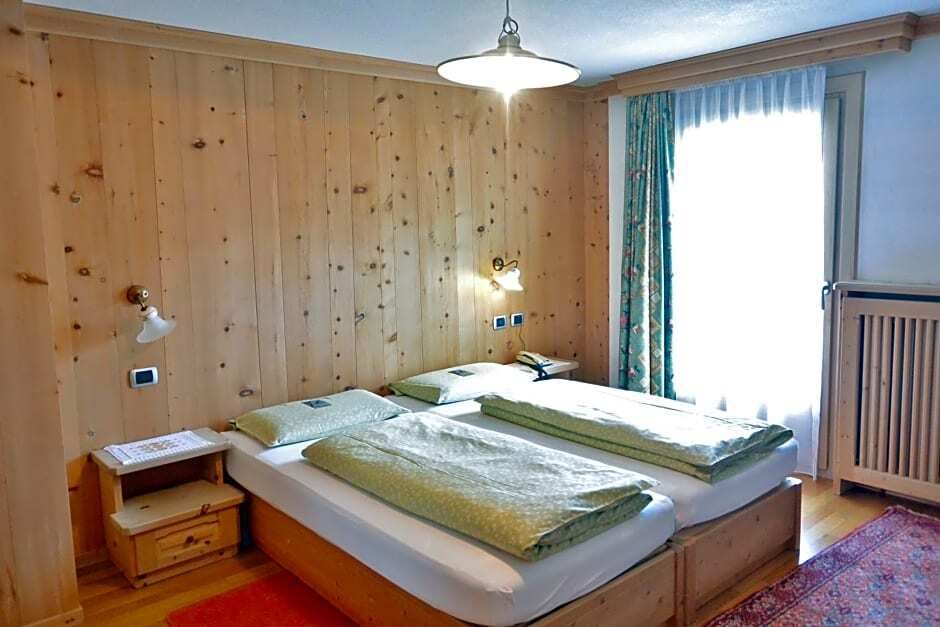 Hotel Garnì al Plan - ליביניו - חדר שינה