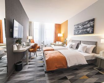 Hotel Metropolitan - ז'שוב - חדר שינה