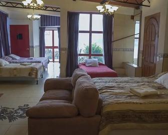 Tekoa Spaces - San Antonio Palopó - Slaapkamer