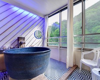 Yubara Onsen Gamelan - Maniwa - Habitación