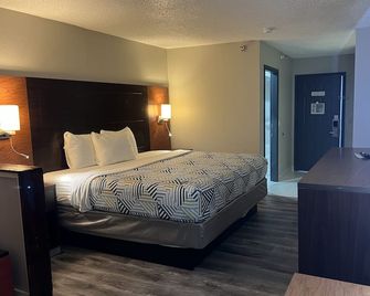 Motel 6 Tulsa, Ok - Airport - טולסה - חדר שינה