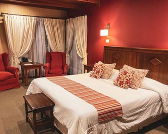 Boutique Hotel La Cantera - אל קאלאפטה - חדר שינה