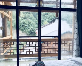 Zhangjiajie one step to heaven inn (Yangjiajie ticket office) - ג'אנגג'יאיי - מרפסת