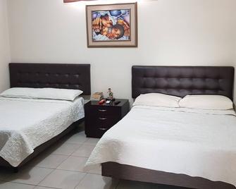 Ncg Suite - Guayaquil - Yatak Odası