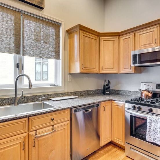 Kitchen view of Modern Victorian With Old World Charm