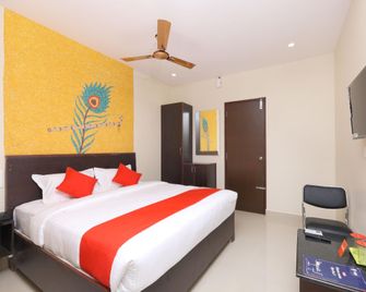 Capital O 14735 Nakshatra Grand - Tirupati - Habitación