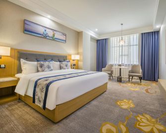 Jinfeng Hotel (Loudi Marriott City Plaza Flagship Store) - Loudi - Bedroom
