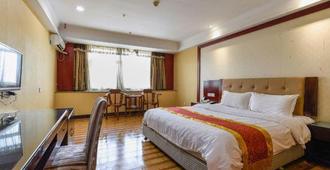 Huangjue Hotel - Huizhou - Bedroom