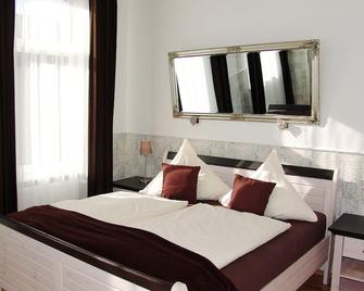 Hotel Garni Landhaus Uttum - Krummhörn - Schlafzimmer