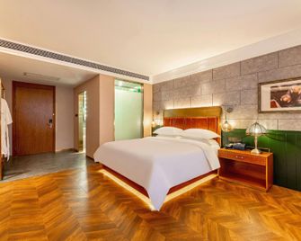James Joyce Coffetel Hotel (Qinhuangdao Development Zone Yanshan University) - Qinhuangdao - Schlafzimmer