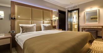 Premier Hotel Dnister - לבוב - חדר שינה