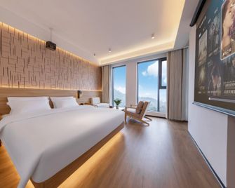 Western Family Theme Hotel (Ya'an Bifengxia Branch) - Ya'an - Bedroom