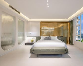 Molian Hotel - Xishuangbanna - Schlafzimmer