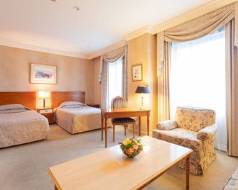 The Saihokukan Hotel - נגאנו - חדר שינה